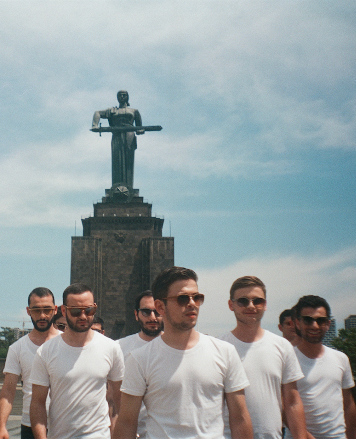 soldiers with sunglasses in front of Mother Armenia statue in Armenia