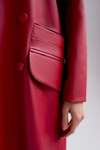 Belted vegan leather trench coat in red