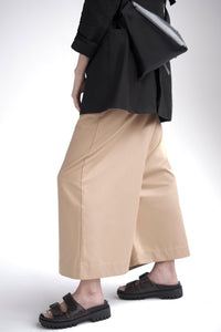 Wide leg pants with wrap and cargo pocket in tan
