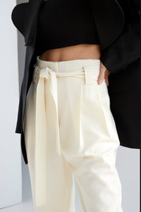 Belted cotton wide leg pleated pants in cream