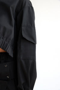Cropped cargo jacket with wide crossover band in black