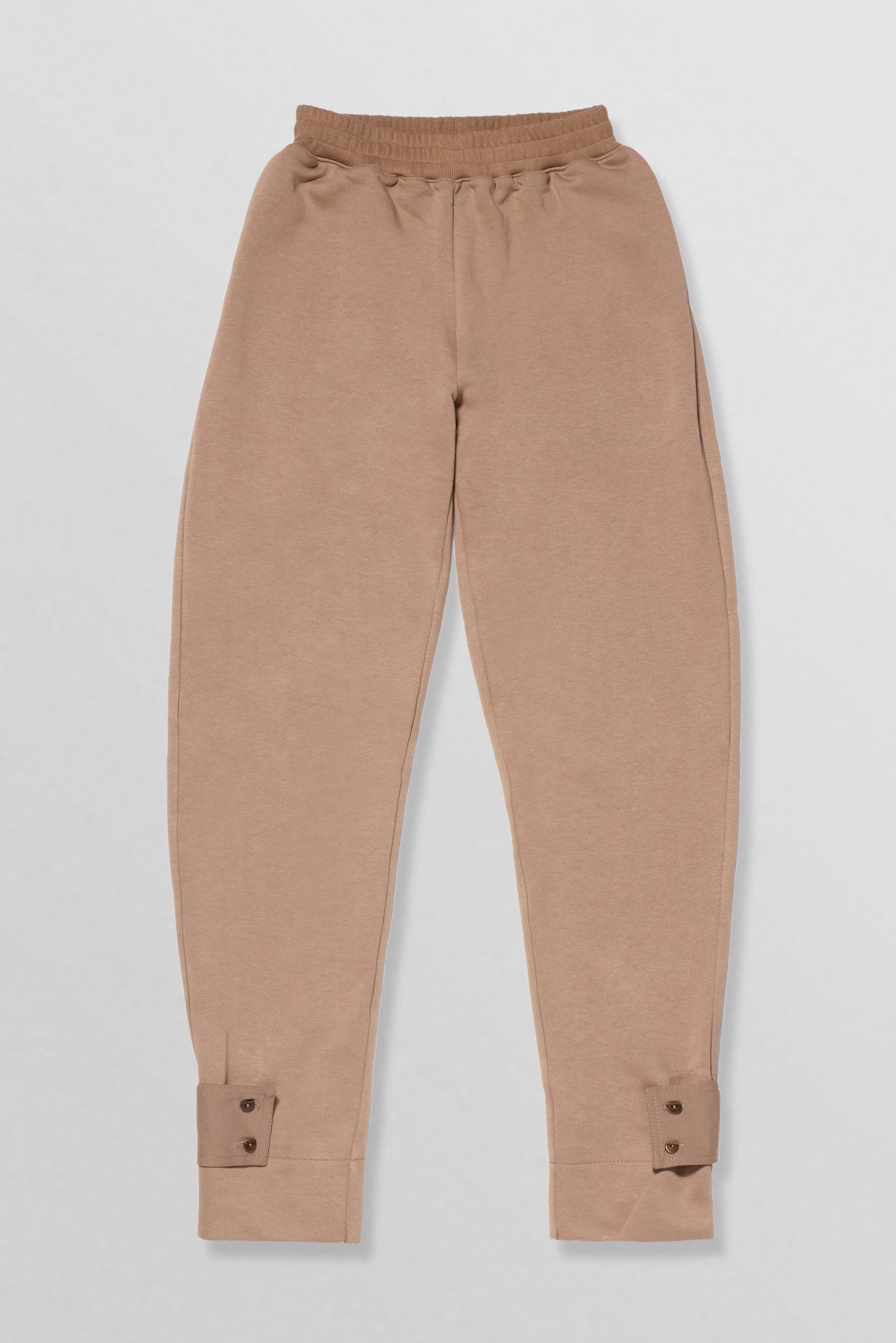 Relaxed cotton track pants with detachable tab cuffs in tan
