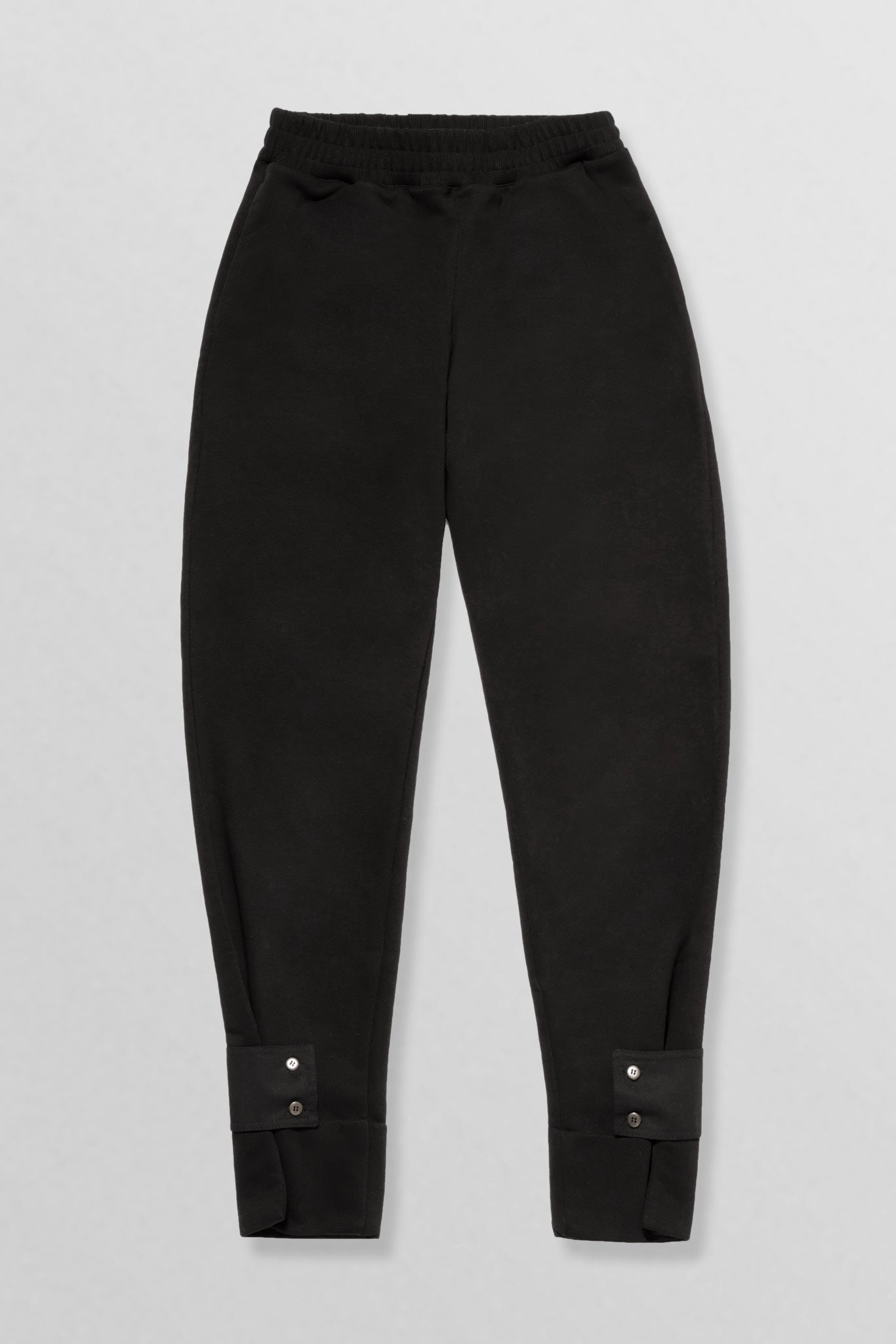 Relaxed cotton track pants with detachable tab cuffs in black
